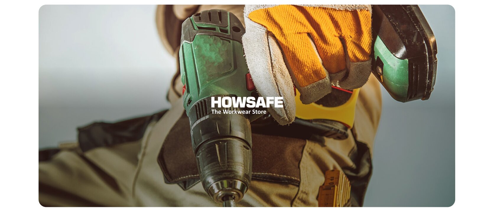 HowSafe construction worker with power drill and safety equipment - The Workwear Store