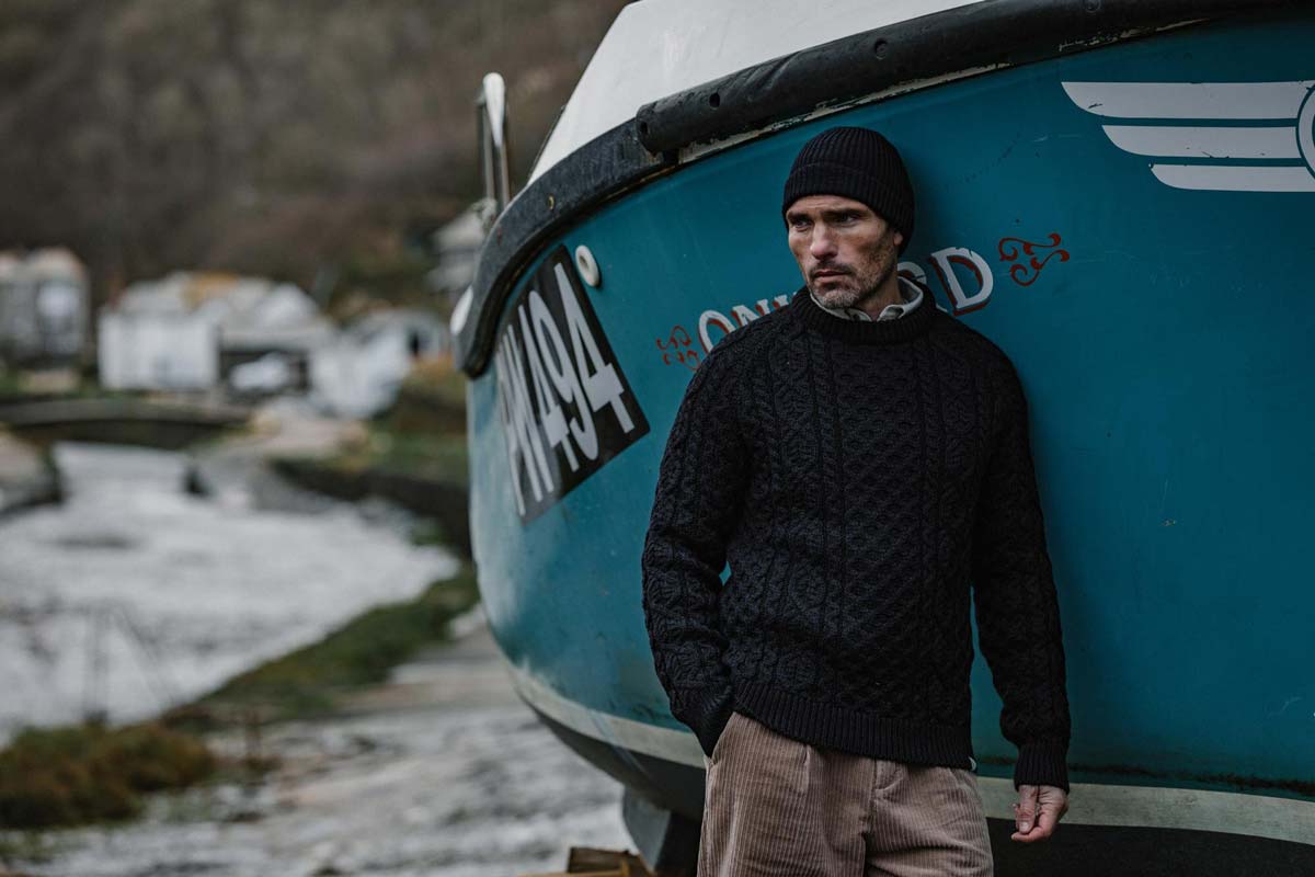 An example of product photography by Bitter Lemon Creative. A man wearing Peregrine clothes, in a lifestyle shot